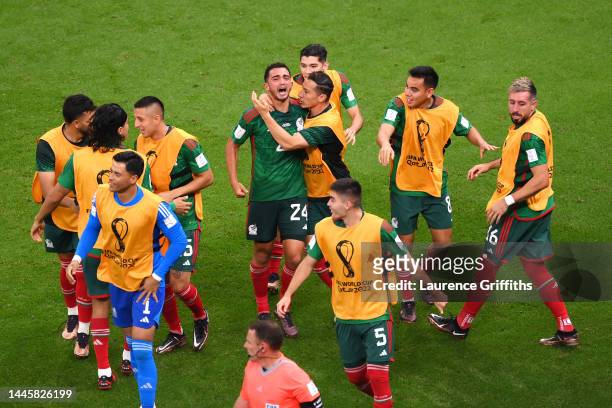Luis Chavez of Mexico celebrates with teammates after scoring their team's second goal during the FIFA World Cup Qatar 2022 Group C match between...