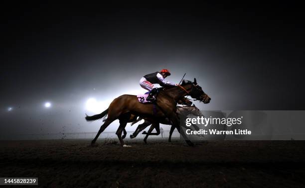 Purple Ribbon ridden by Jack Mitchell races in the Unibet Wild Flower Stakes is run at Kempton Park on November 30, 2022 in Sunbury, England.