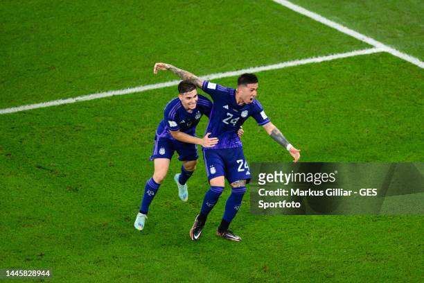 Julian Alvarez of Argentinia celebrates after scoring his team's second goal with Enzo Fernandez during the FIFA World Cup Qatar 2022 Group C match...