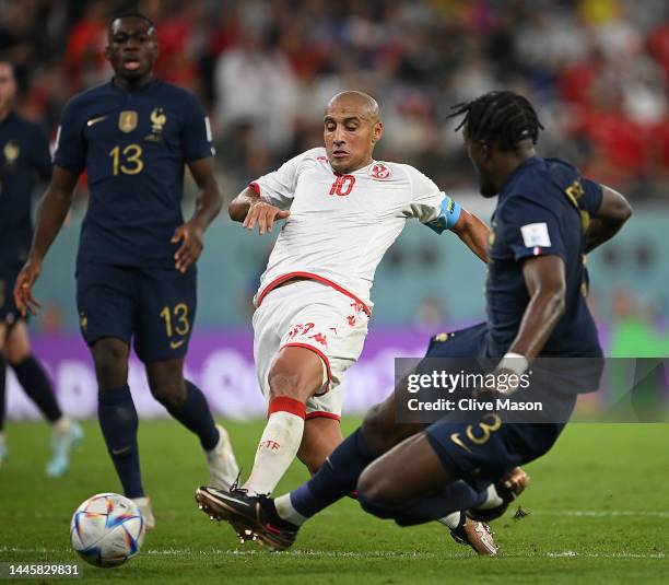 Wahbi Khazri of Tunisia shoots and scores their team's first goal during the FIFA World Cup Qatar 2022 Group D match between Tunisia and France at...