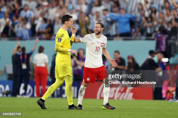Wojciech Szczesny and Grzegorz Krychowiak of Poland react after the FIFA World Cup Qatar 2022 Group C match between Poland and Argentina at Stadium...