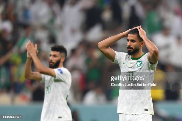 Saleh Al-Shehri of Saudi Arabia applauds fans after the 1-2 loss the FIFA World Cup Qatar 2022 Group C match between Saudi Arabia and Mexico at...