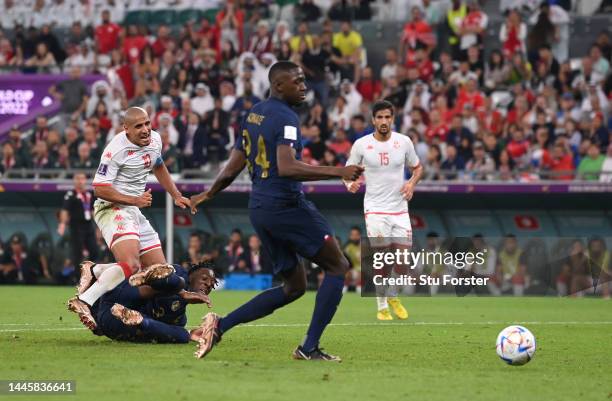 Tunisia player Wahbi Khazri shoots to score the winning goal during the FIFA World Cup Qatar 2022 Group D match between Tunisia and France at...