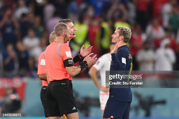 France player Antoine Griezmann discusses his disallowed goal with the match officials after the FIFA World Cup Qatar 2022 Group D match between...