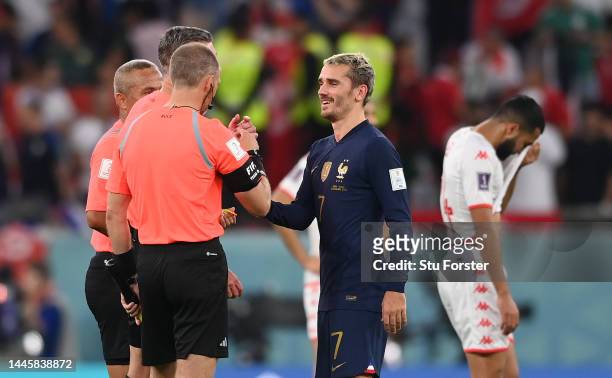 France player Antoine Griezmann discusses his disallowed goal with the match officials after the FIFA World Cup Qatar 2022 Group D match between...