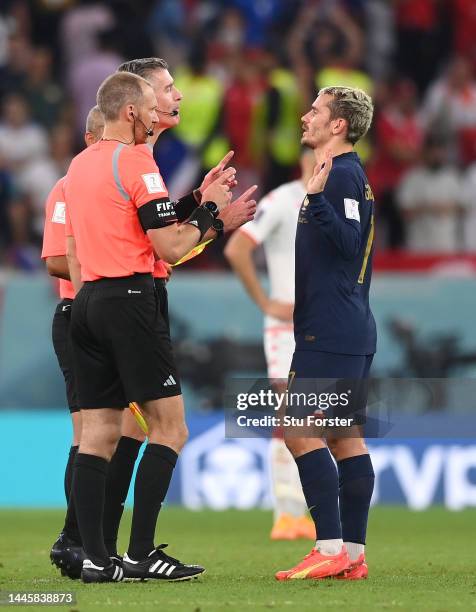 France player Antoine Griezmann discusses his disallowed goal with the match officials after the FIFA World Cup Qatar 2022 Group D match between...