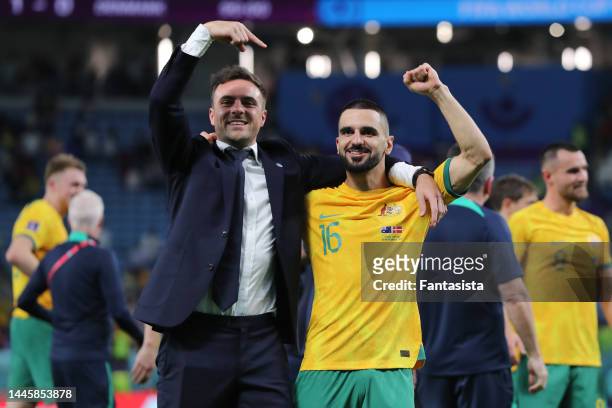 James Duvcevski General Manager of Australia Men's National Teams celebrates the 1-0 victory and the team's passage to the knockout stages with Aziz...