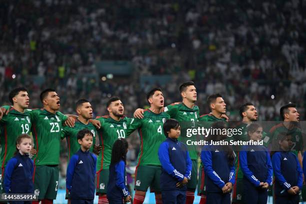 Mexico players line up for the national anthem prior to the FIFA World Cup Qatar 2022 Group C match between Saudi Arabia and Mexico at Lusail Stadium...