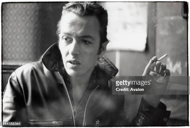 Portrait of Joe Strummer formerly of The Clash photographed in London in February 1988. 24203 - Exclusive