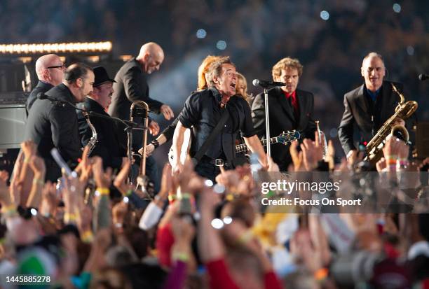 Bruce Springsteen and the E Street Band perform at the Bridgestone Halftime Show during Super Bowl XLIII between the Arizona Cardinals and the...