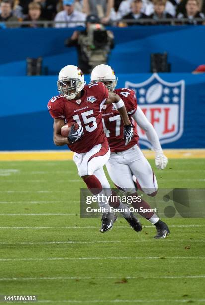 Steve Breaston of the Arizona Cardinal runs with the ball against the Pittsburgh Steeler in Super Bowl XLIII on February 1, 2009 at Raymond James...