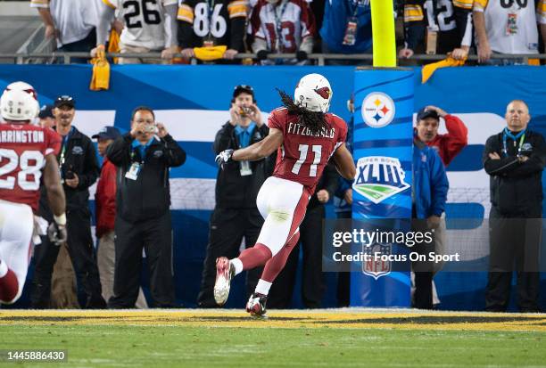 Larry Fitzgerald of the Arizona Cardinal scores a touchdown against the Pittsburgh Steeler in Super Bowl XLIII on February 1, 2009 at Raymond James...