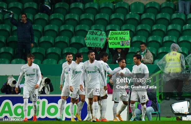 Pedro Goncalves of Sporting CP celebrates with teammates after scoring a goal during the Liga Bwin match between Sporting CP and SC Farense at...