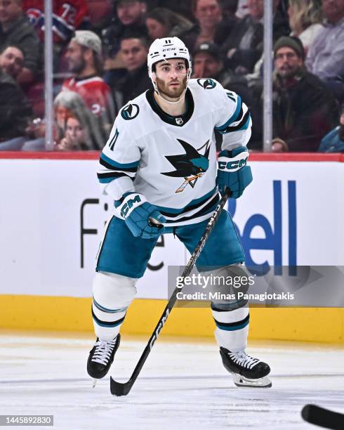 Luke Kunin of the San Jose Sharks skates against the Montreal Canadiens during the third period at Centre Bell on November 29, 2022 in Montreal,...