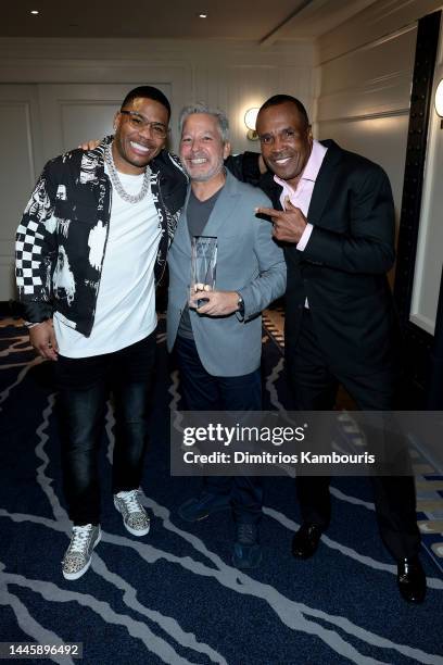 Nelly, Honoree Michael Greenberg, and Sugar Ray Leonard attend the 2022 Footwear News Achievement Awards at Cipriani South Street on November 30,...