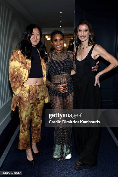 Sun Choe, Deja Riley, and Nikki Neuburger pose with the award for Launch of the Year for Lululemon during the 2022 Footwear News Achievement Awards...