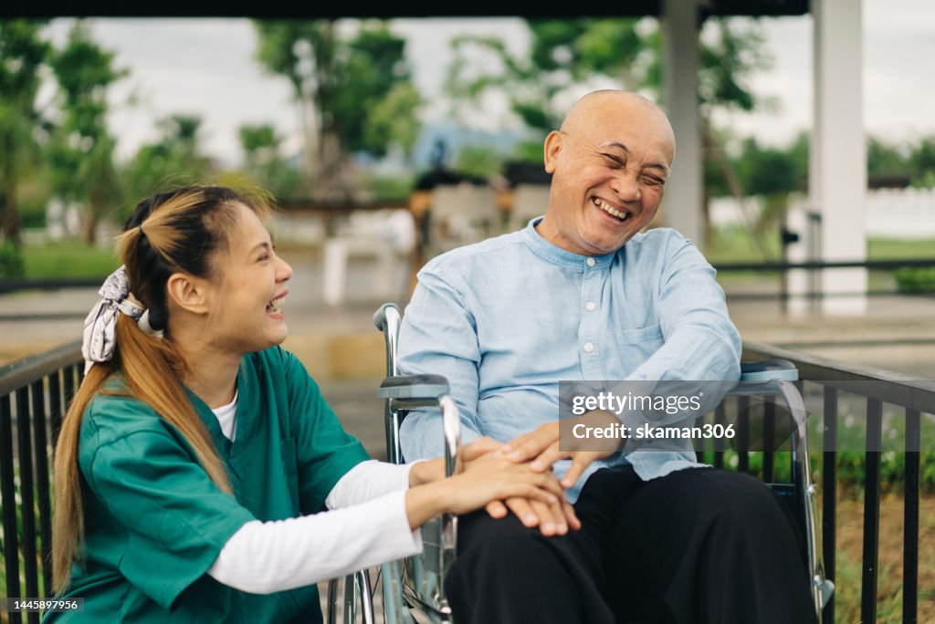 Facial expression Asian seniors who are in good spirits enjoy talking with the nurse at the health care center Aging gracefully concept