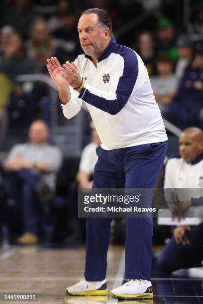 Head coach Mike Brey of the Notre Dame Fighting Irish reacts against the Michigan State Spartans during the second half at the Purcell Pavilion at...