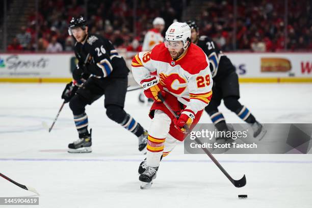 Dillon Dube of the Calgary Flames skates with the puck against the Washington Capitals during the first period of the game at Capital One Arena on...