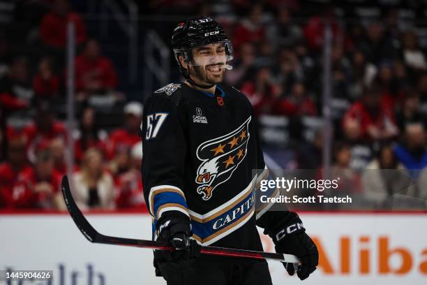 Trevor van Riemsdyk of the Washington Capitals reacts against the Calgary Flames during the first period of the game at Capital One Arena on November...