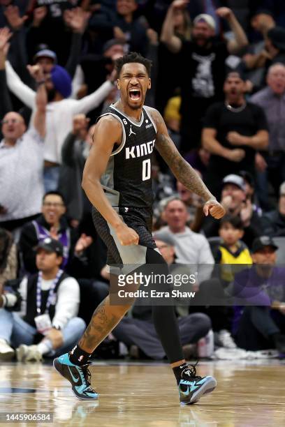 Malik Monk of the Sacramento Kings reacts after the Kings made a basket against the Indiana Pacers at Golden 1 Center on November 30, 2022 in...