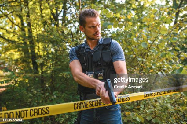 caucasian male detective following a suspect - slovenia police stock pictures, royalty-free photos & images