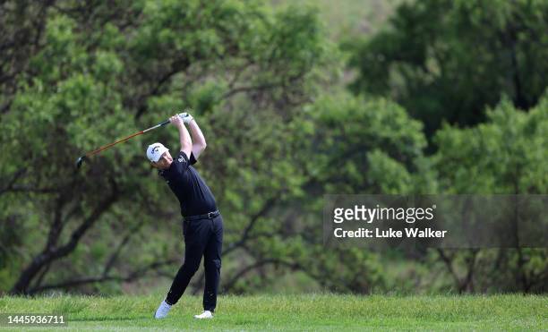 Branden Grace of South Africa plays his second shot on the 18th hole during Day One of the Investec South African Open Championship at Blair Atholl...