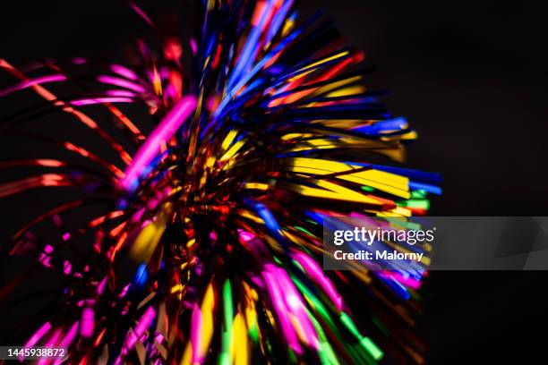 firework concept. party decorations on black background. - glow düsseldorf stock-fotos und bilder