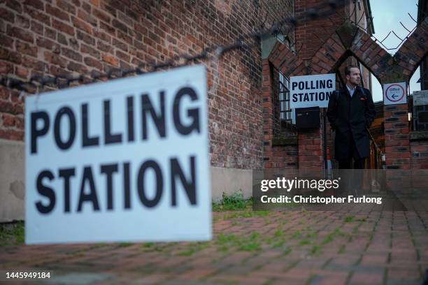 Member of the public leaves the Festival Church polling station after voting in the Chester by-election on December 01, 2022 in Chester, England. The...