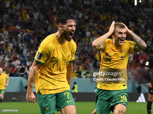 Mathew Leckie of Australia celebrates after scoring their team's first goal during the FIFA World Cup Qatar 2022 Group D match between Australia and...