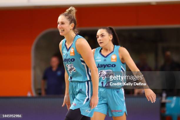 Rebecca Cole of the Flyers celebrates with team mates during the round four WNBL match between Southside Flyers and Sydney Flames at State Basketball...