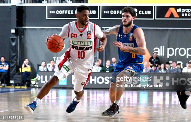 Corey Webster of the Wildcats breaks away from the defence during the round 9 NBL match between the Brisbane Bullets and Perth Wildcats at Nissan...