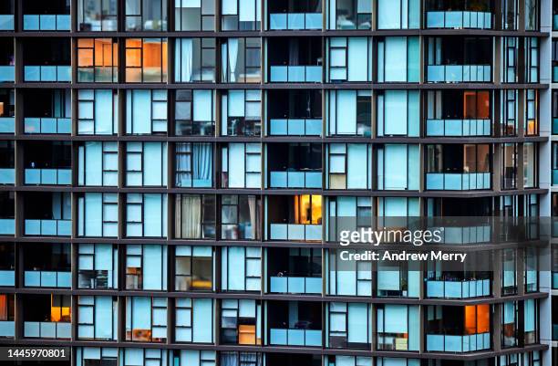 apartment building at dusk - renting stock pictures, royalty-free photos & images