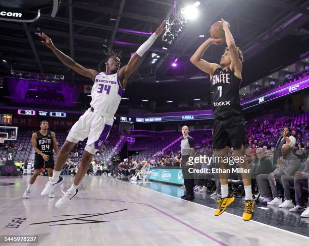 Mojave King of G League Ignite shoots a 3-pointer against Keon Ellis of the Stockton Kings in the second quarter of their game at The Dollar Loan...