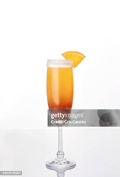 sunrise strawberry mimosa cocktail - cocktail isolated stock pictures, royalty-free photos & images