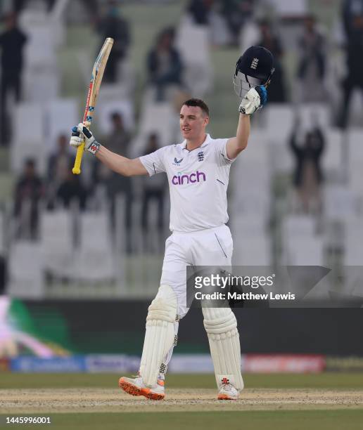 Harry Brook of England celebrates reaching his century during the First Test Match between Pakistan and England at Rawalpindi Cricket Stadium on...