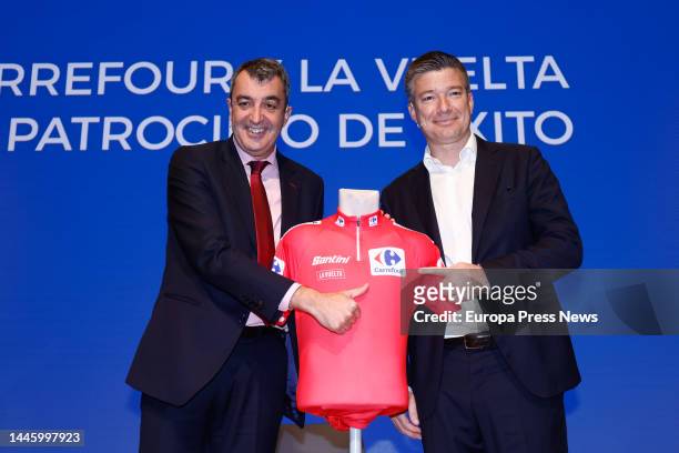 La Vuelta General Manager Javier Guillen and Carrefour Spain CEO Alexandre de Palmas pose during a Carrefour Ciclismo sports breakfast at the Meeting...