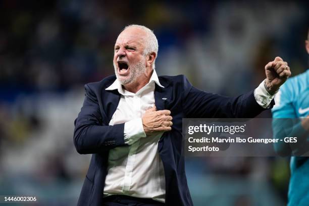 Head Coach Graham Arnold of Australia celebrates victory after the FIFA World Cup Qatar 2022 Group D match between Australia and Denmark at Al Janoub...