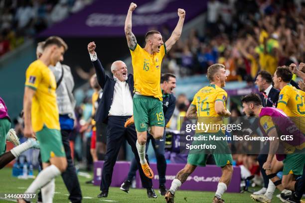 Head Coach Graham Arnold and Mitchell Duke of Australia celebrates victory after the FIFA World Cup Qatar 2022 Group D match between Australia and...