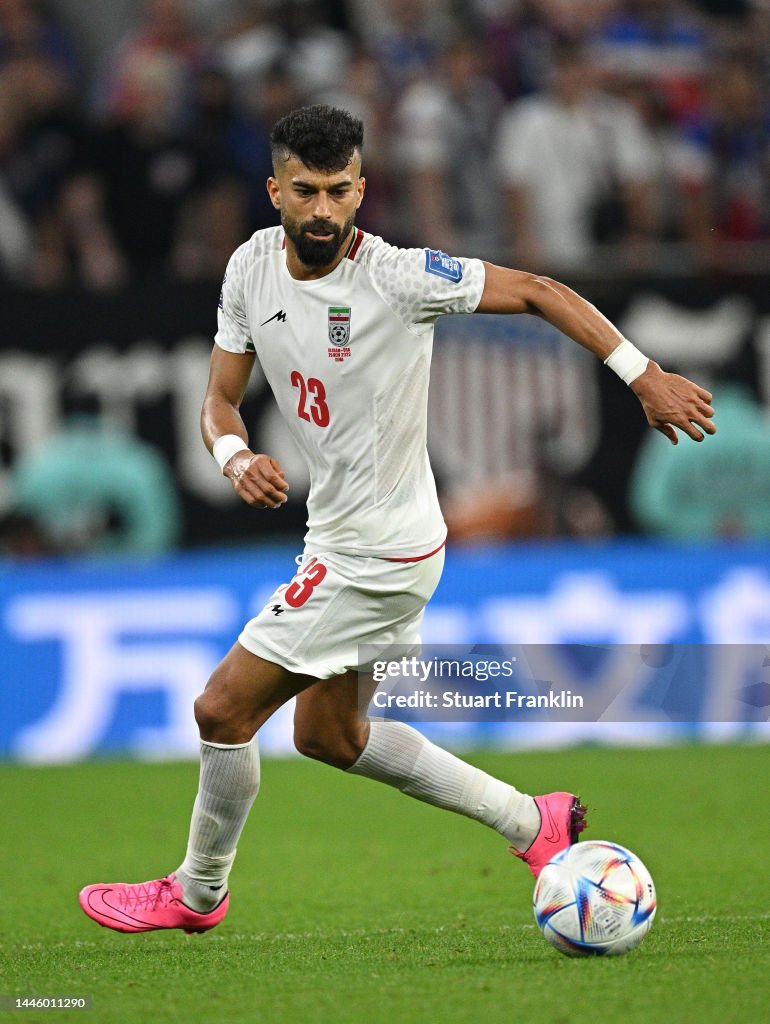 Ramin Rashidian Ramin Rezaeian of Iran in action during the FIFA World Cup Qatar 2022 ...