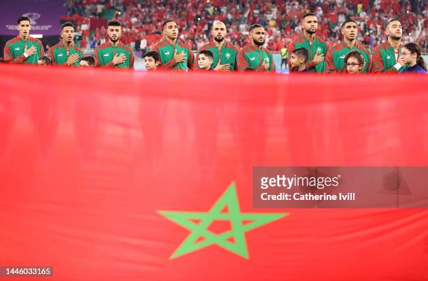 Morocco players line up for the national anthem prior to the FIFA World Cup Qatar 2022 Group F match between Canada and Morocco at Al Thumama Stadium...