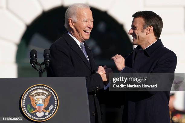 President Joe Biden and French President Emmanuel Macron wave as Biden welcomes Macron to the White House for an official state visit arrival...