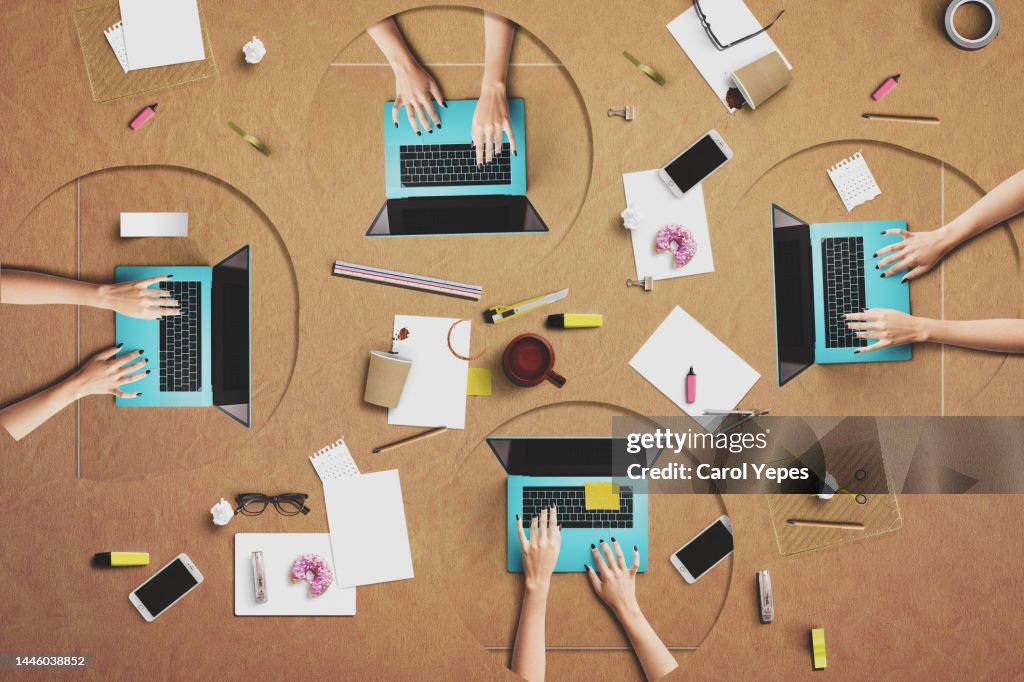 Conceptual image female hands using laptop in the office.top view
