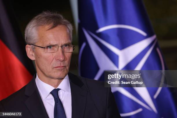 Secretary General Jens Stoltenberg and German Chancellor Olaf Scholz speak to the media during talks at the Chancellery on December 01, 2022 in...