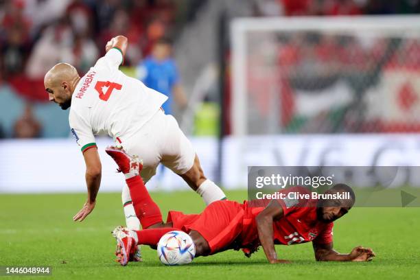 Junior Hoilett of Canada battles for possession with Sofyan Amrabat of Morocco during the FIFA World Cup Qatar 2022 Group F match between Canada and...