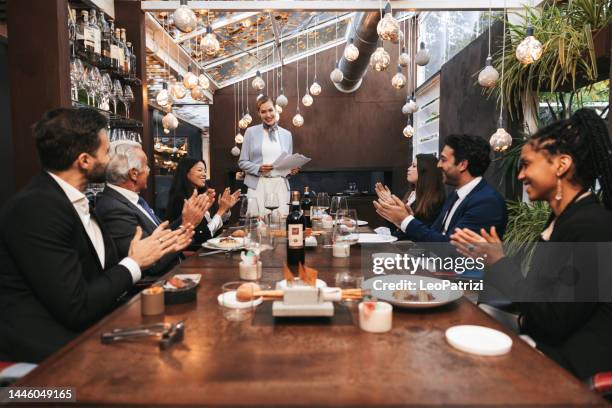 businesswoman taking a speech at the corporate lunch - dining presentation food imagens e fotografias de stock