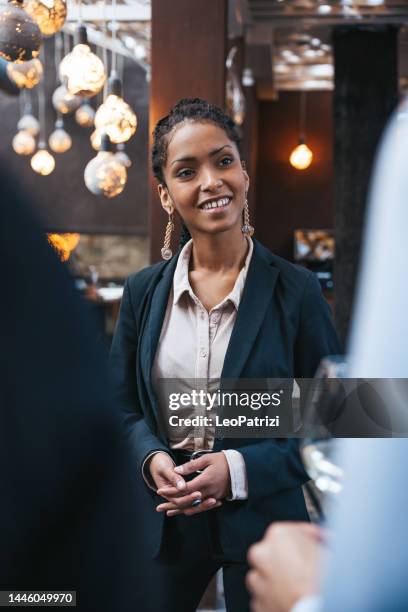 business meeting in a restaurant - businesswoman hotel stock pictures, royalty-free photos & images