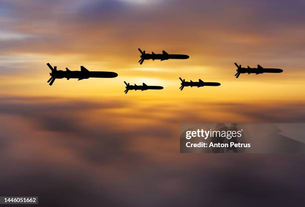 cruise missiles against the sunset sky - 2020 kick off stock pictures, royalty-free photos & images