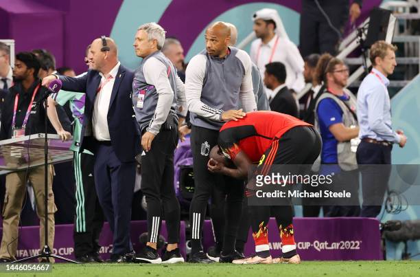 Romelu Lukaku of Belgium reacts with assistant coach Thierry Henry after the FIFA World Cup Qatar 2022 Group F match between Croatia and Belgium at...
