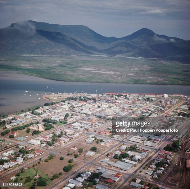 Aerial view of buildings in the port city of Cairns beside Trinity Inlet in Queensland, Australia circa 1967.